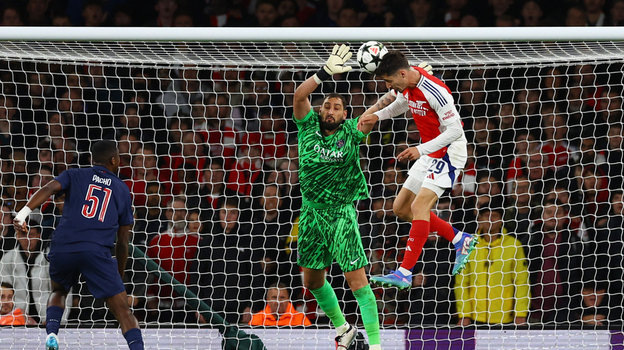    Кай Хаверц («Арсенал») забивает первый гол в ворота Джанлуиджи Доннаруммы («ПСЖ»). Reuters