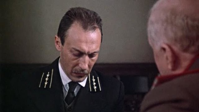 Олег Янковский в роли гимназического учителя в фильме Р.Балаяна "Филер". Мне кажется, по знакам различия у него невысокий чин X класса - коллежский секретарь. Если кто разбирается лучше - меня поправят