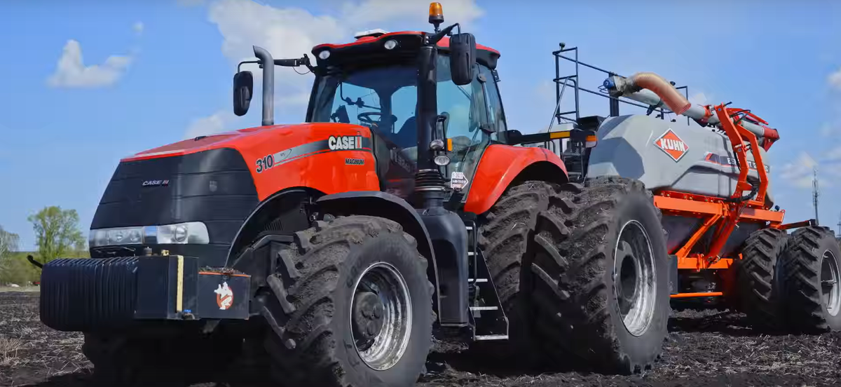 Трактор Case с сеялкой Espro RT 12000 RC 