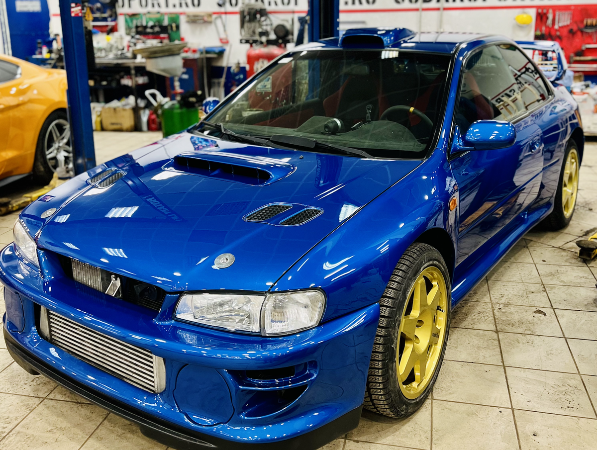 Subaru impreza STI 1998 года, выглядит так как будто вчера сошла с конвейера. Гордость КУЗОВПОРТ