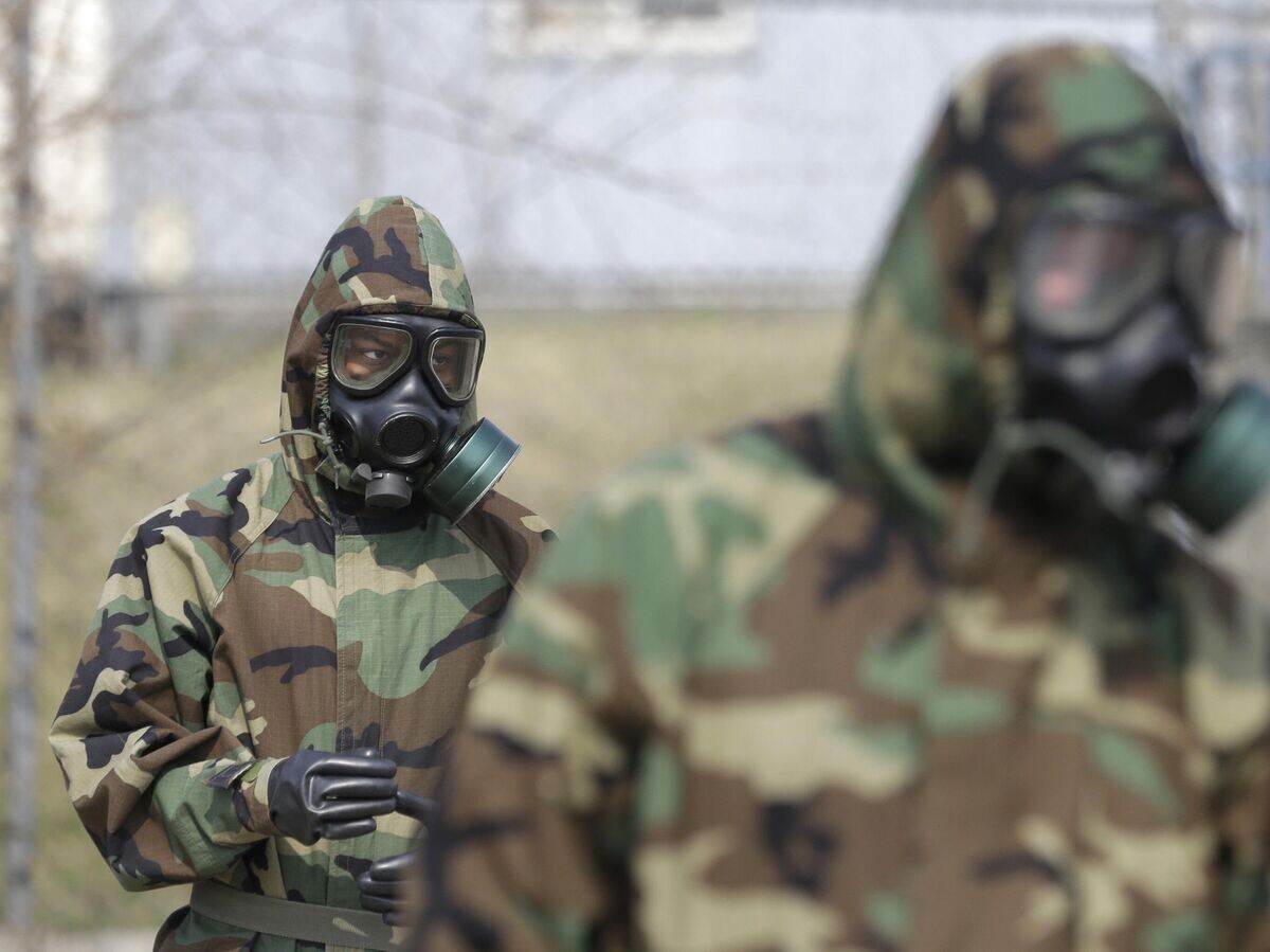 Военнослужащие химического батальона армии США© AP Photo / Lee Jin-man
