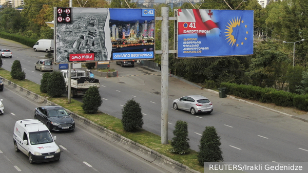     Фото: REUTERS/Irakli Gedenidze   
 Текст: Андрей Резчиков,   
Дмитрий Александров, Тбилиси