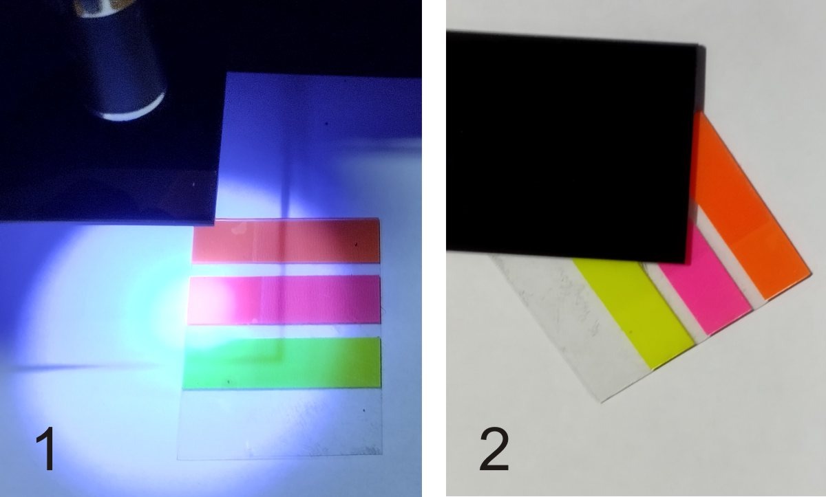 1. Флуоресцентные полоски бумаги при освещении их в темноте через угол черного светофильтра из стекла Вуда светодиодом с длиной волны 365 нм. 2. тот же светофильтр при дневном освещении на тех же флуоресцентных полосках.