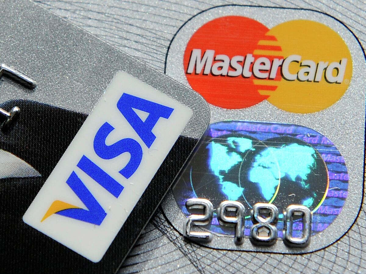    Платежные системы Visa и MasterCard© AP Photo / Martin Meissner