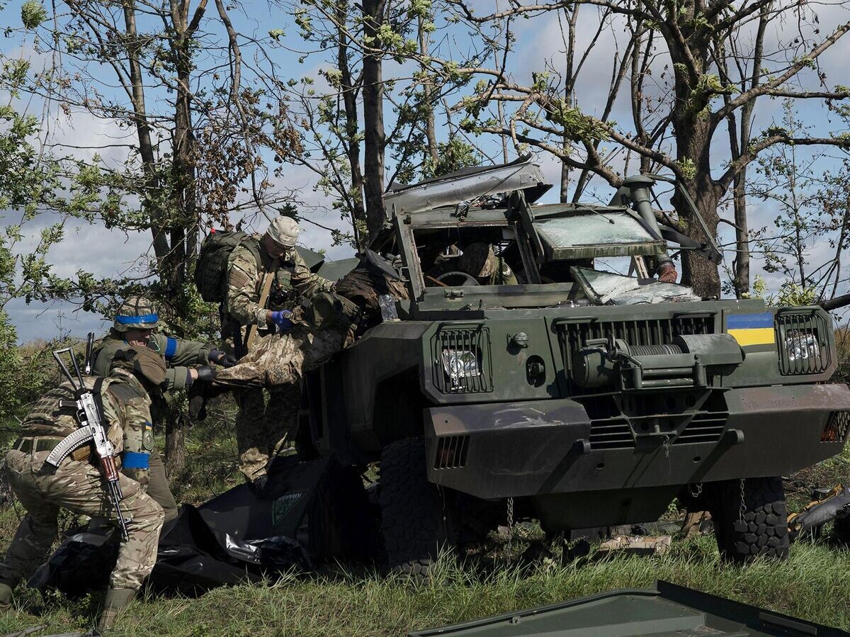    Украинские военные в Харьковской области© AP Photo / Leo Correa