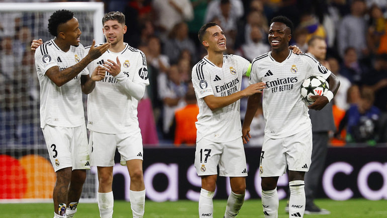    Эдер Милитао, Федерико Вальверде, Лукас Васкес и Винисиус (слева направо) после матча «Реал» — «Боруссия» (5:2). Reuters