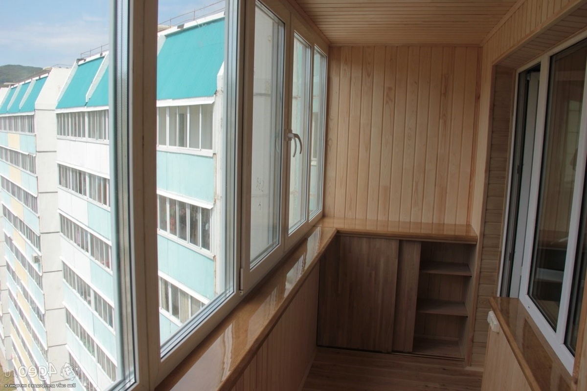 Обшивка балкона сайдингом дизайн