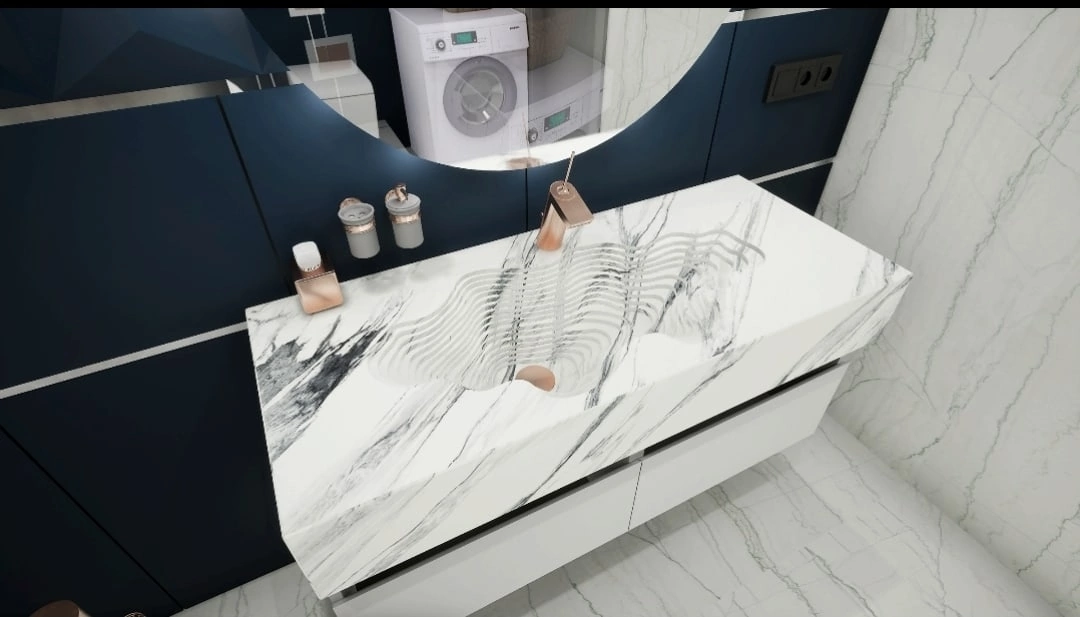 Столешница с многослойной раковиной в виде озера из керамогранита - это идеальное решение для вашей ванной комнаты. Она сочетает в себе прочность и эстетичность, обеспечивая долговечность и стильный внешний вид.

Кроме прочности и функциональности, этот товар также отличается стильным дизайном. Его форма озера придает ему уникальный и элегантный вид, который будет привлекать внимание и восхищение гостей.

Если вы хотите придать своему интерьеру особый шарм, то эта необычная раковина - идеальное решение для вас. Она сочетает в себе высокое качество, эстетичность и функциональность, делая вашу ванную комнату стильную и практичную.