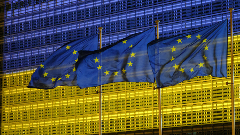     Флаги ЕС и Украины Gettyimages.ru Thierry Monasse