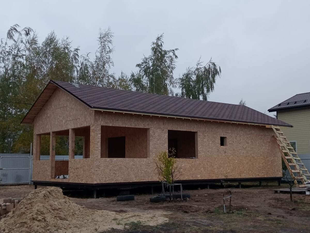 Гибкая черепица на доме из СИП-панелей