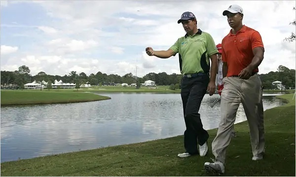 Вудс и Харрингтон на турнире PGA Championship 2009. Tami Chappell/Reuters