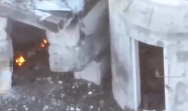    Бетонное укрытие, где прятались люди. Кадр из видео