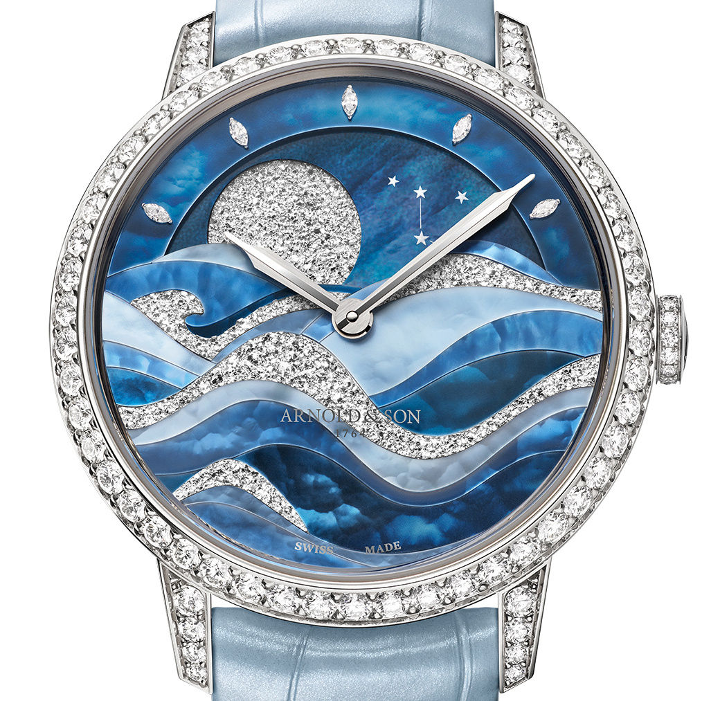 Белое золото, ручной завод, ø 38 мм, толщина 10,4 мм, циферблат - перламутр и маркетри из кристаллов рутения. лимитированная серия - 18 экз.