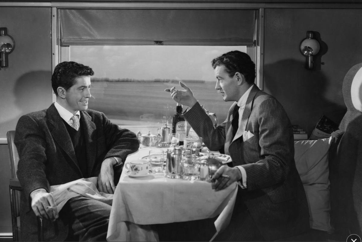 Актер Фарли Грейнджер и актер Роберт Хадсон Уокер в фильме Альфреда Хичкока «Незнакомцы в поезде» (Strangers on a Train)