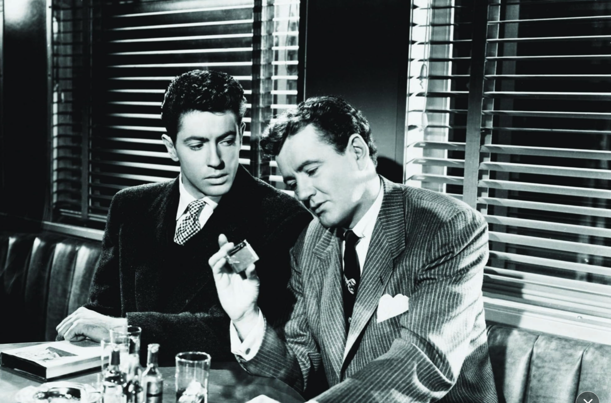 Актер Фарли Грейнджер и актер Роберт Хадсон Уокер в фильме Альфреда Хичкока «Незнакомцы в поезде» (Strangers on a Train) 