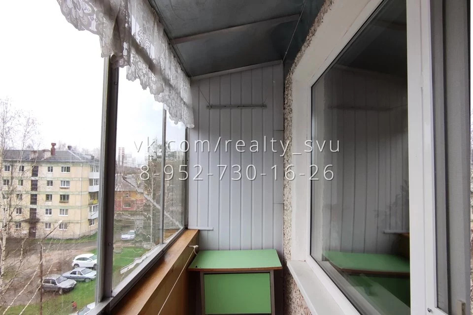 Вид из дома Комарова-3а  на дом Комарова-1.