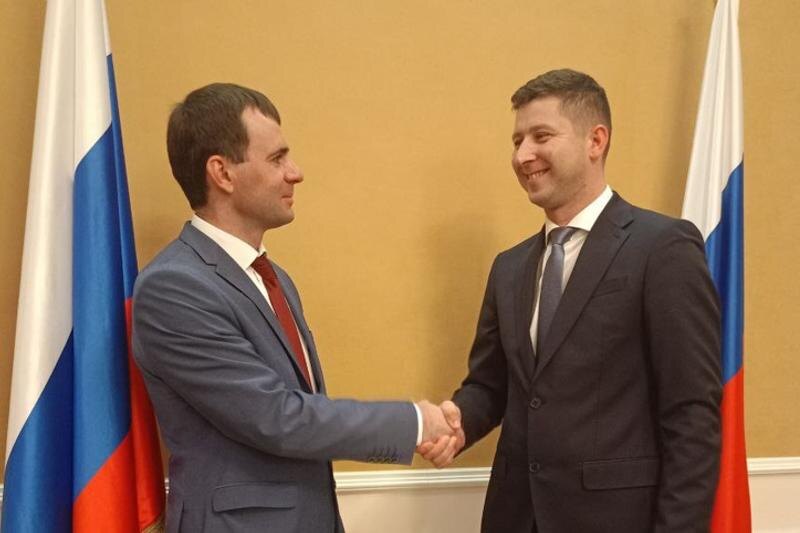    Минрег / Избранный глава Сергей Савченко и министр регполитики Юрий Мироненко