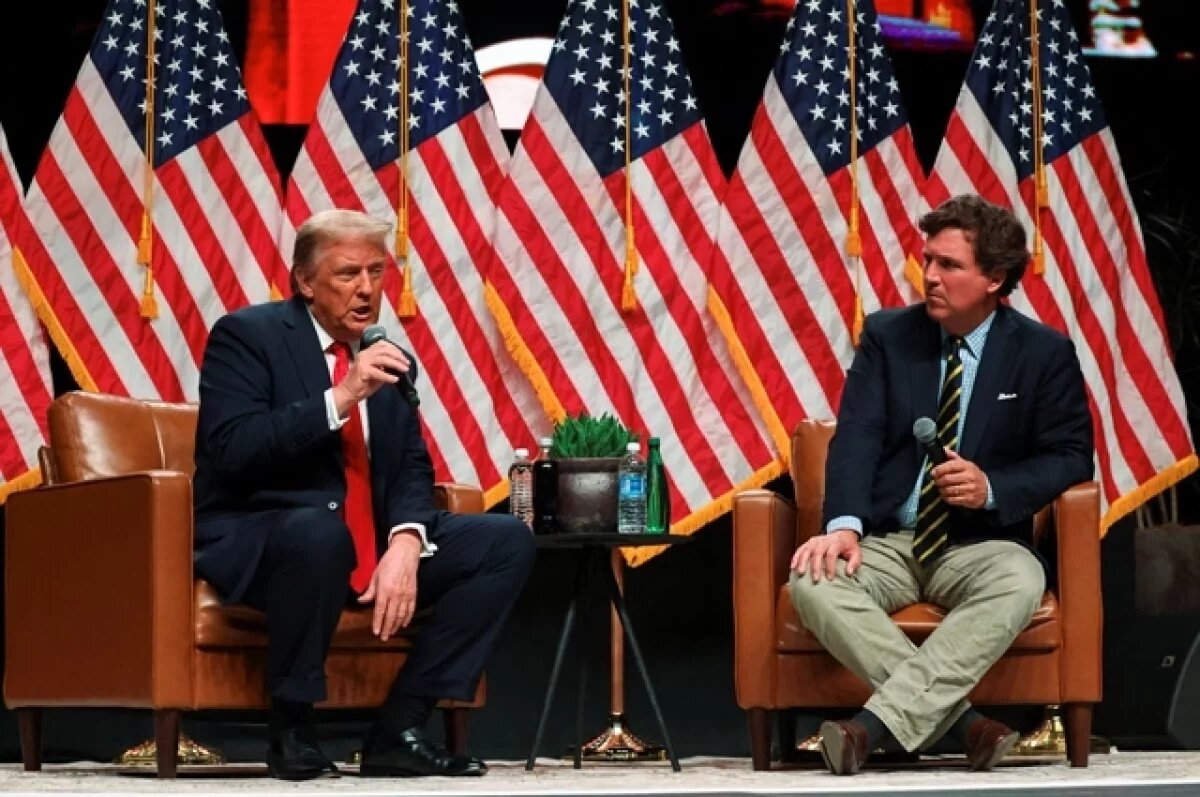    Кандидат в президенты от Республиканской партии и бывший президент США Дональд Трамп и Такер Карлсон.