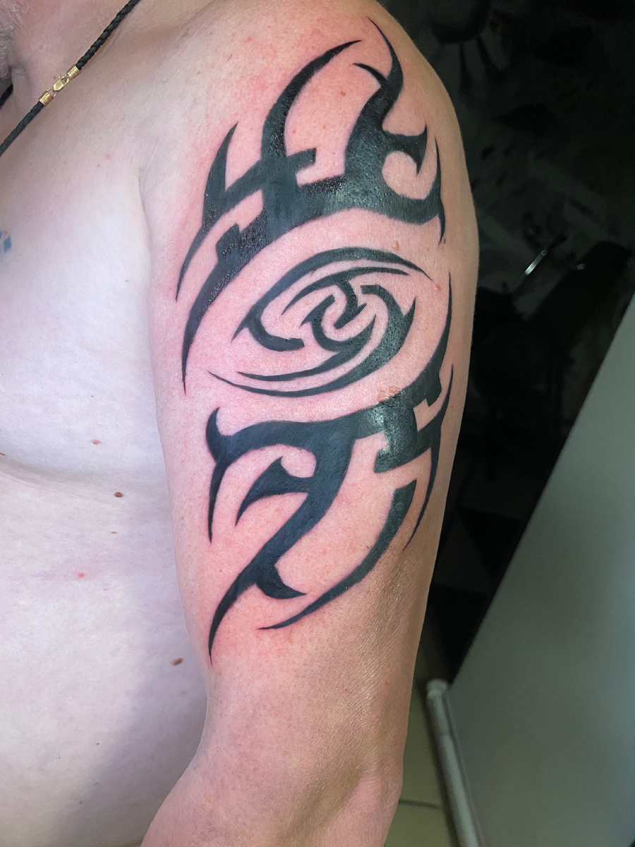 Тату Знак зодиака в стиле Трайбал