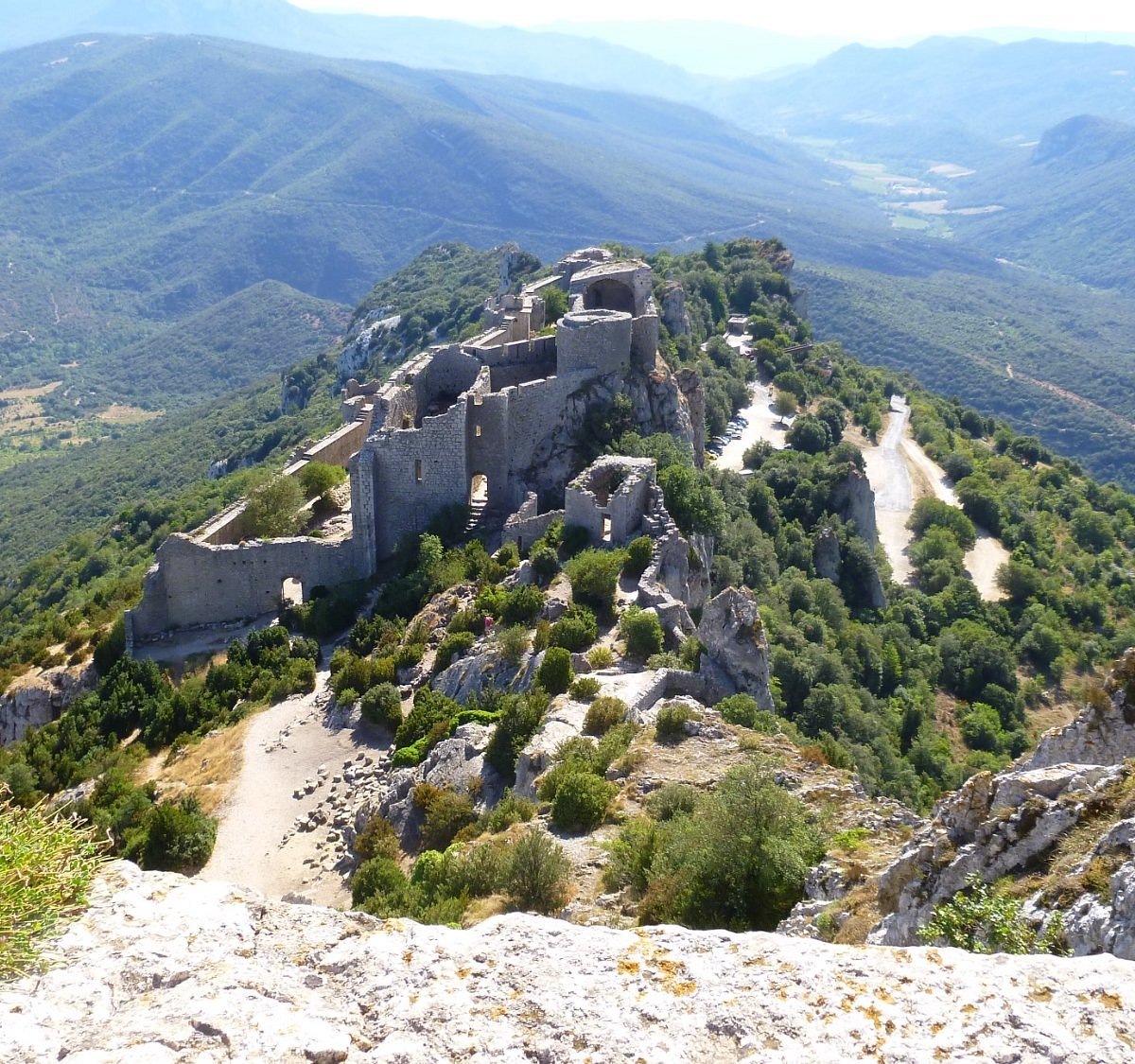 https://dynamic-media-cdn.tripadvisor.com/media/photo-o/0c/68/73/f2/chateau-de-peyrepertuse.jpg?w=1200&h=1200&s=1