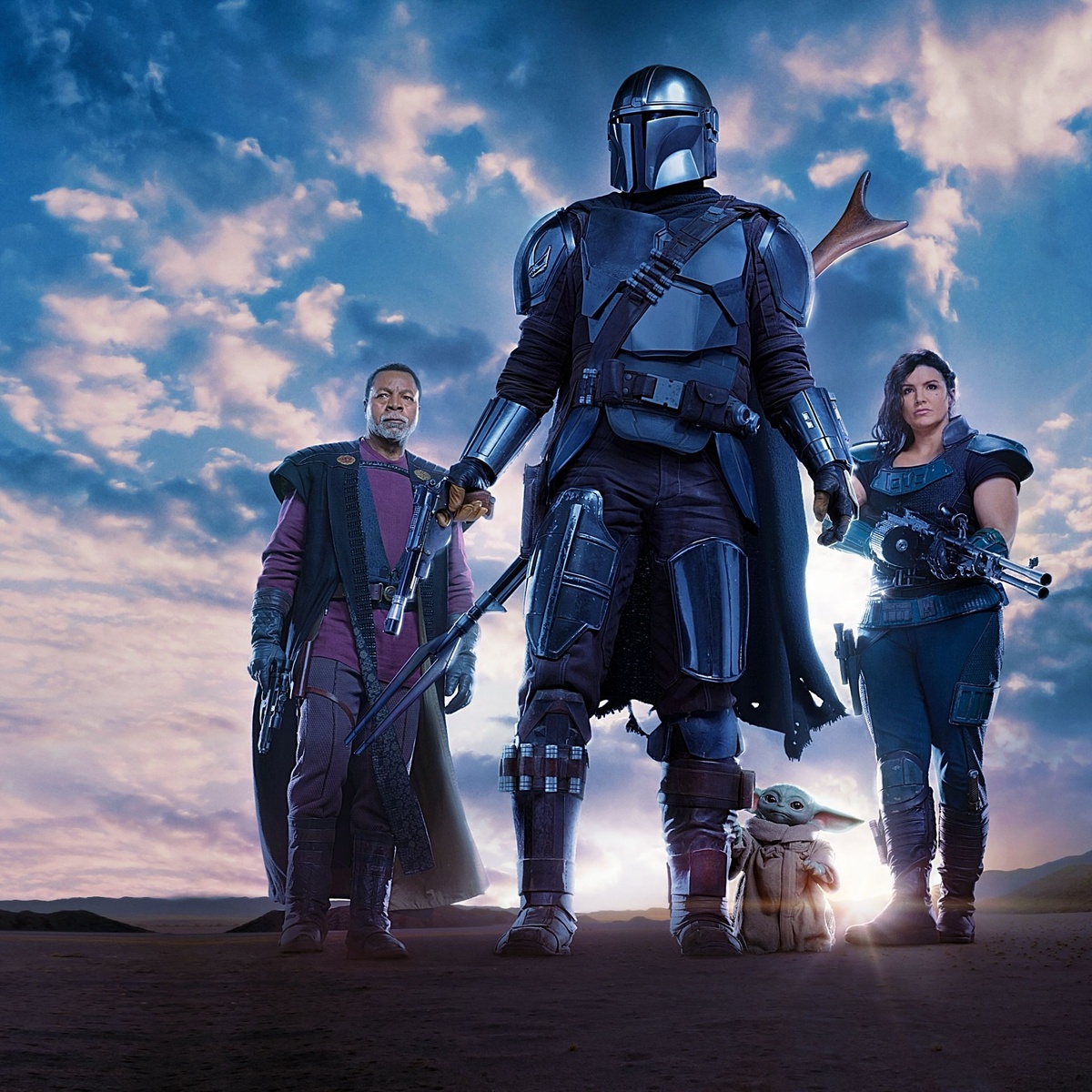 Гриф Карга (Карл Уэзерс), лидер гильдии охотников, Дин Джарвис (Педро Паскаль), Грогу и Кара Дюн (Джина Карано). 