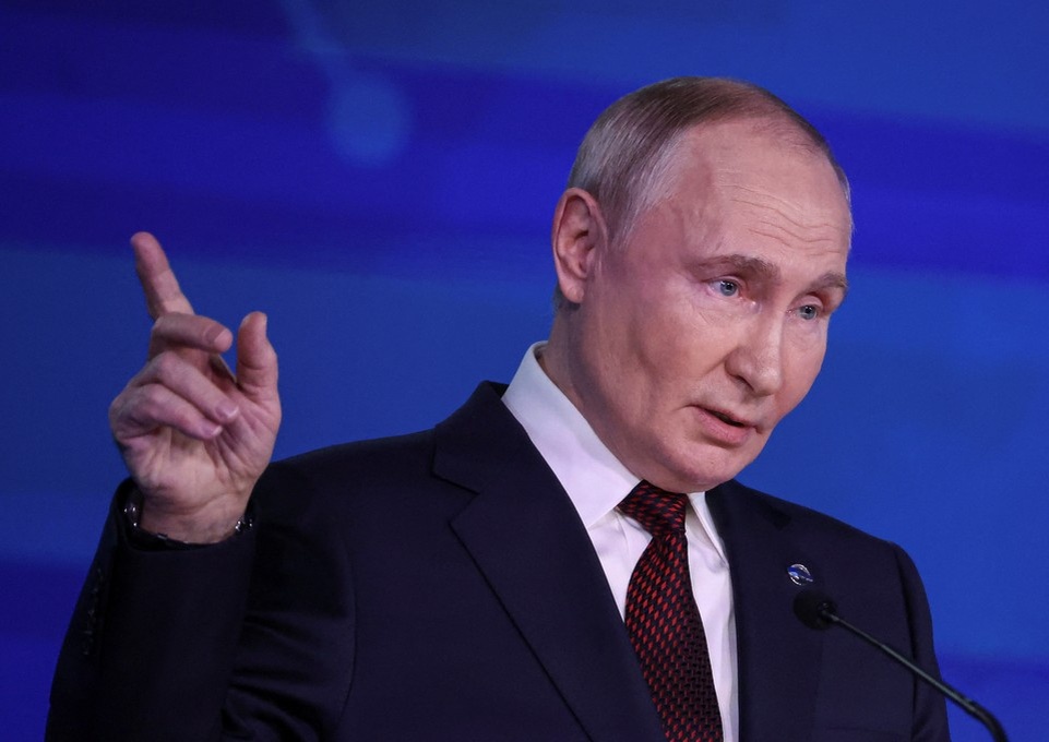    Владимир Путин на площадке пленарной сессии Международного дискуссионного клуба «Валдай». REUTERS