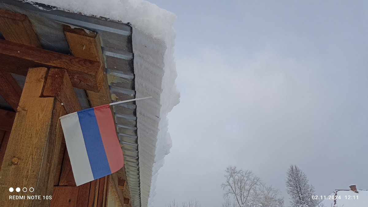 Снег на крыше. Фото автора.