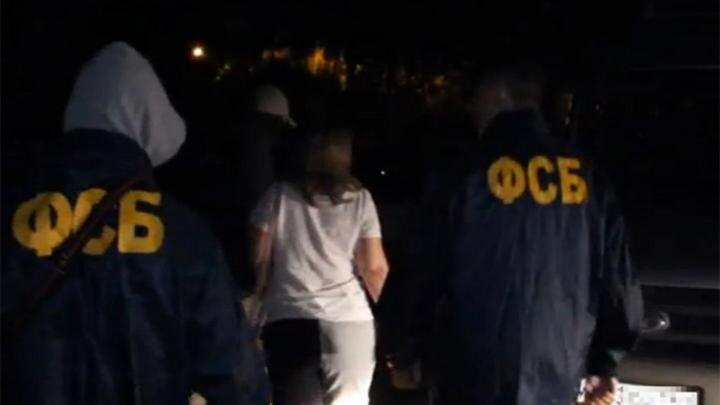 Момент задержания Поповой/Стоп-кадр оперативного видео.