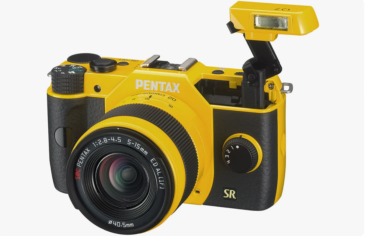 Пентакс с яндекс.картинки это конечно не компакт.
