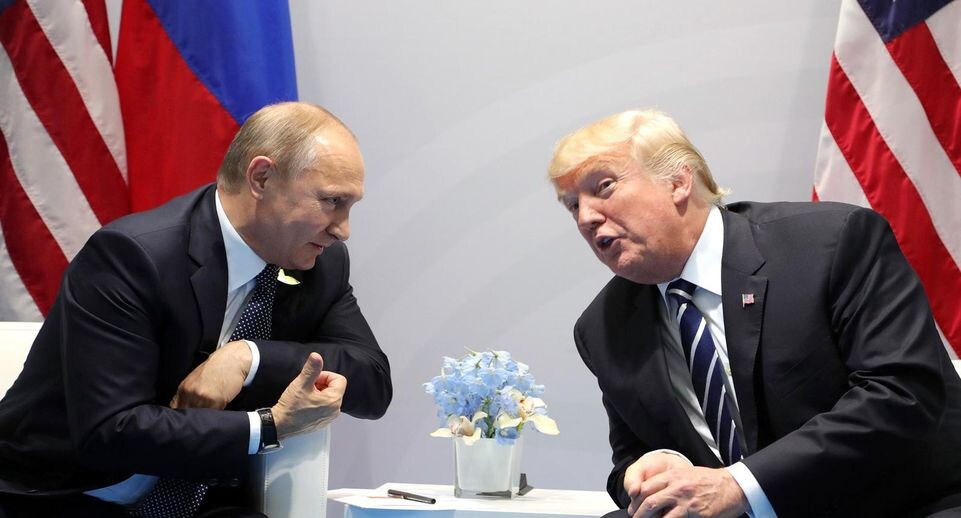    Гамбург, Германия — президенты России и США Владимир Путин и Дональд Трамп на саммите G20, Гамбург, 7 июля 2017 года. Mikhail Klimentyev / Global Look Press