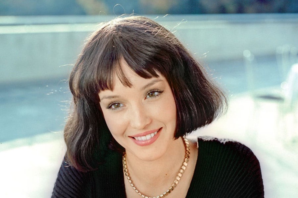    Анна Самохина в роли роковой красавцы Риты в фильме "Воры в законе". / Фото: kinopoisk.ru