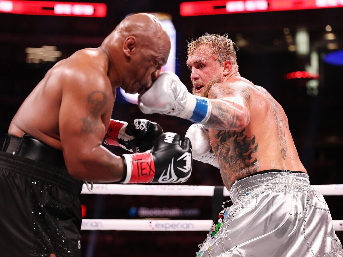    Эпизод боксерского поединка Тайсона против Пола© Getty Images / Al Bello