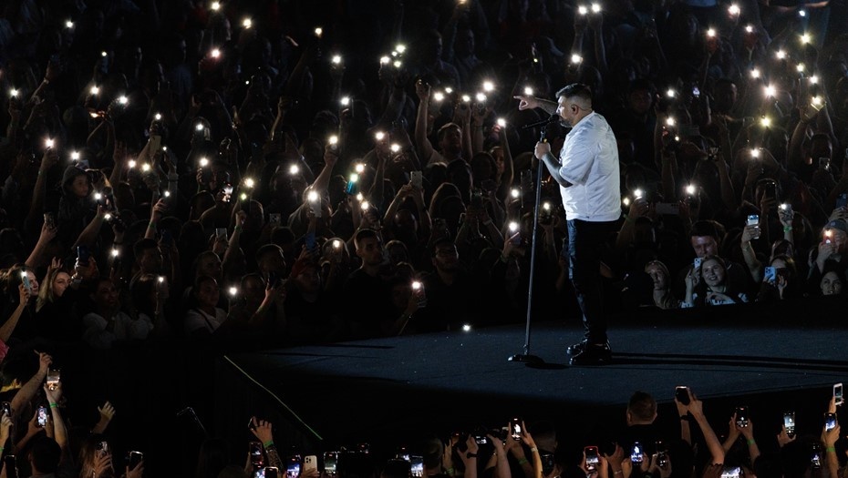    Рэп-исполнитель Баста (Василий Вакуленко) во время концерта, архивное фото. Автор фото: Сергей Елагин / Бизнес Online / ТАСС