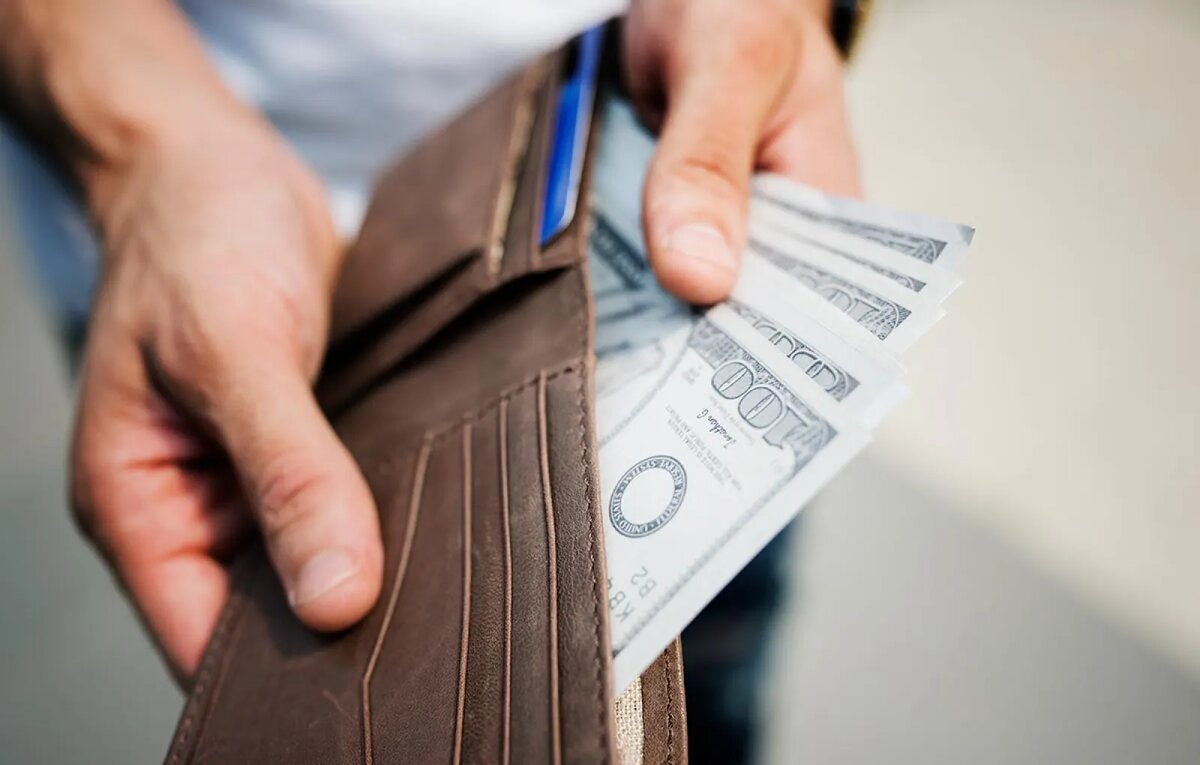    Наличные доллары США. © freepik.com