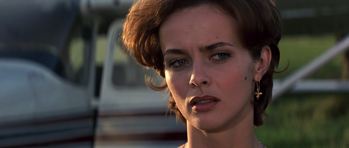 Изабелла Скорупко в роли Натальи Семёновой (к/ф "Золотой глаз", 1995)