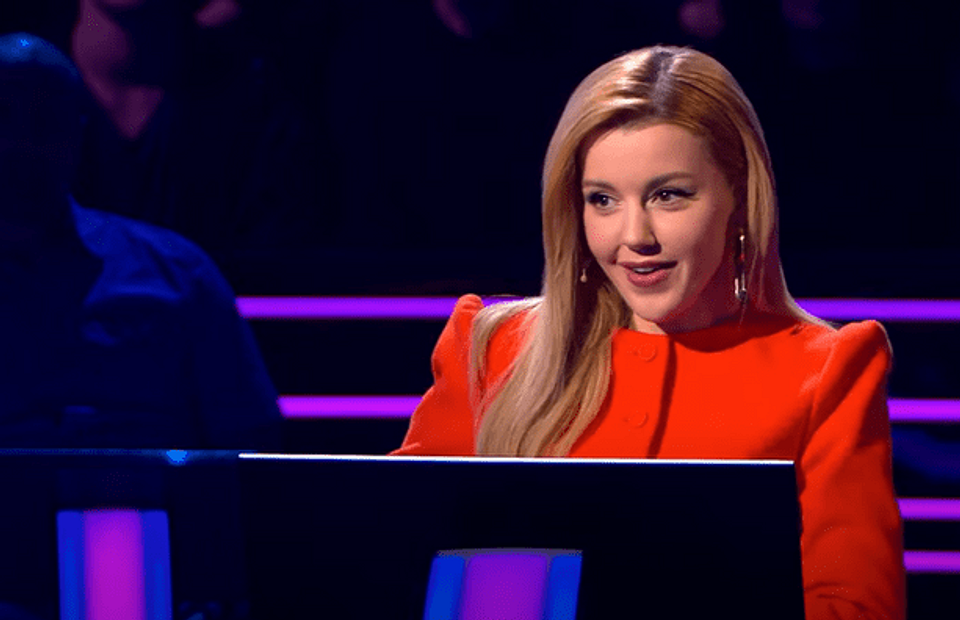 Ведущая популярной программы "Кто хочет стать миллионером" Ю. Караулова. Фото Яндекс.Картинки. 