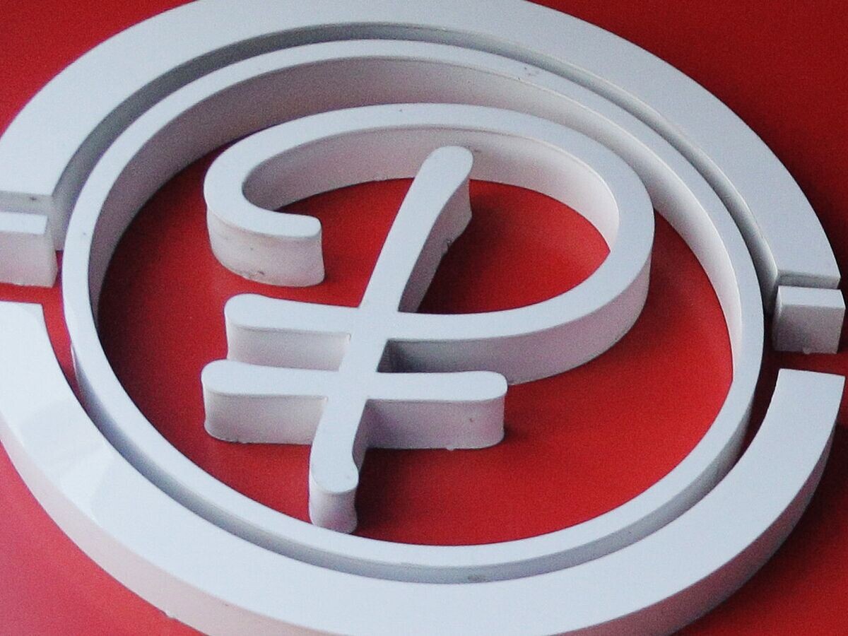    Знак рубля© РИА Новости . Николай Гернет