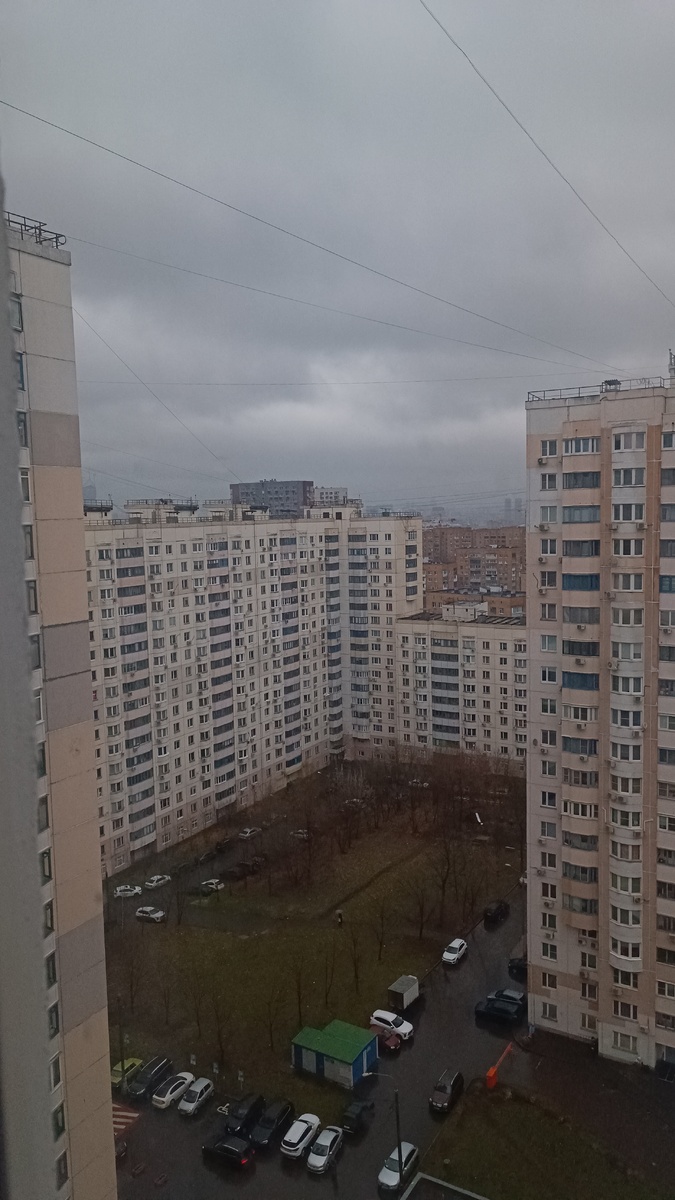 Слева от окна