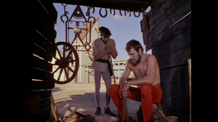 «Город мастеров» (1965). Кузнец Мартин (справа) /мой скрин из данного фильма, находящегося в свободном доступе в интернете/.    