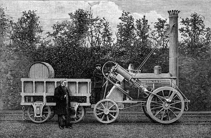 Паровоз "Ракета" вместе с его создателями Джордж Стифенсон и его сыном. 