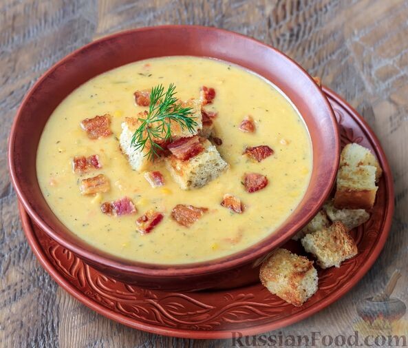 куриные ножки, грудинка копчёная, кукуруза консервированная, лук репчатый, морковь, перец болгарский, сливки, масло сливочное, чеснок, лавровый лист, перец душистый горошком, тимьян, кумин, соль, перец чёрный молотый, сухарики пшеничные, зелень