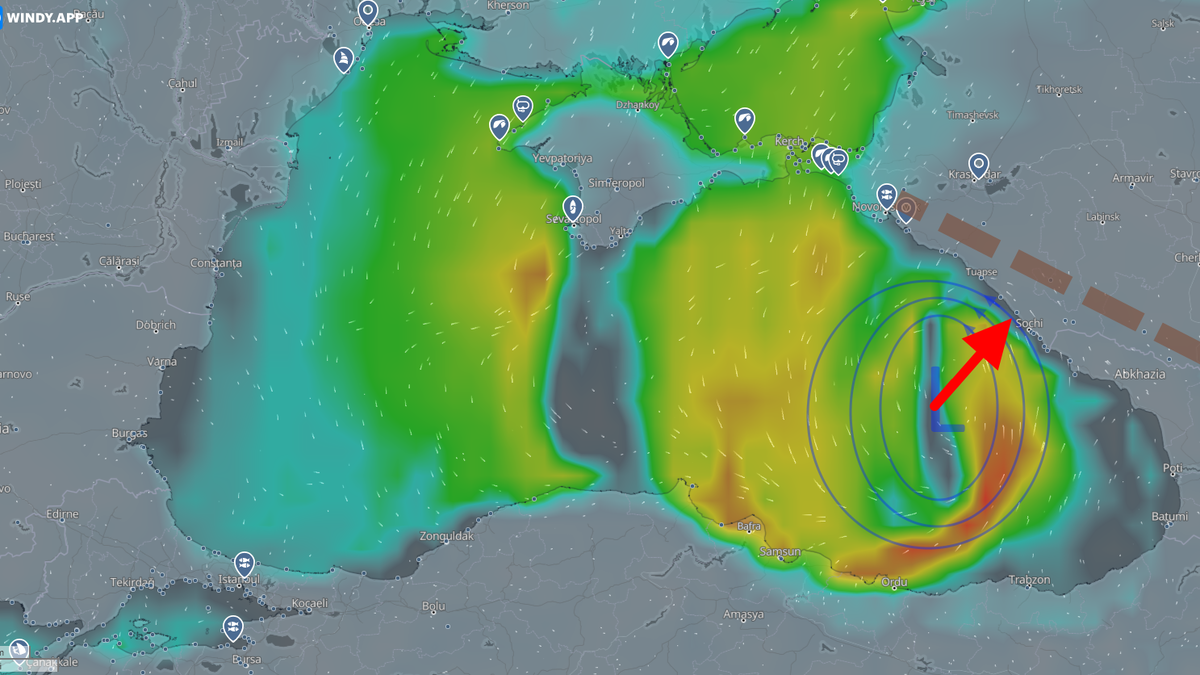 Красная стрелка - движение циклона. Коричневый пунктир - Главный Кавказский хребет