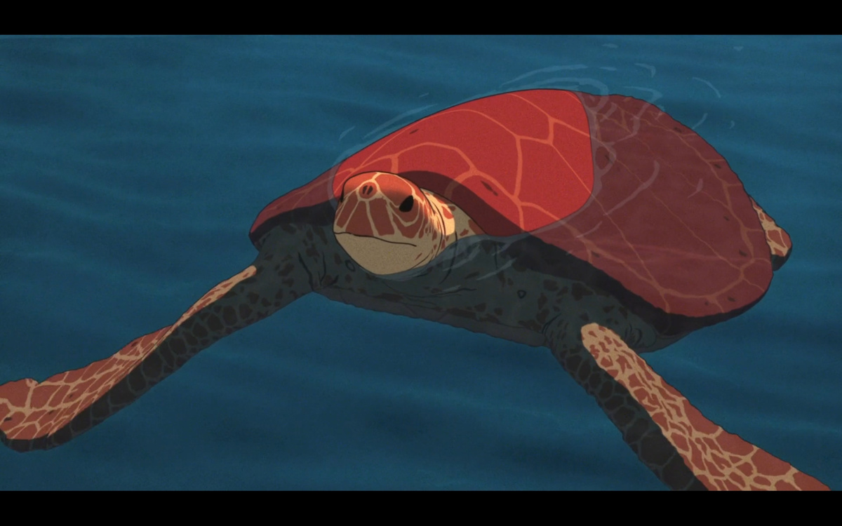 Это черепаха. Она красного цвета.