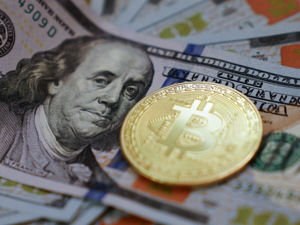    Биткоин© РИА Новости . Владимир Астапкович