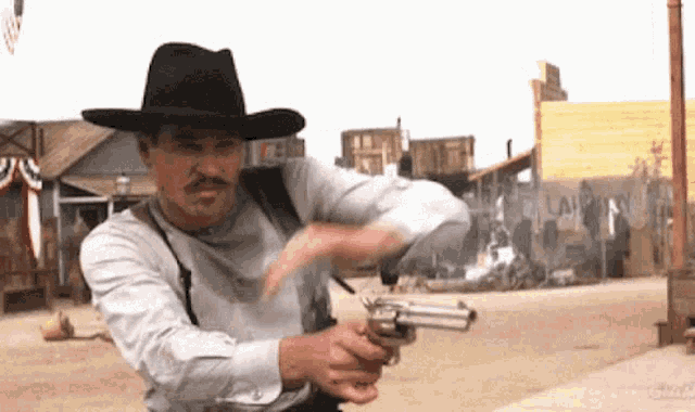 Стрельба из револьвера (tenor.com/ru/view/on-fire-cowboy-shooting-gun-gif-15317612)