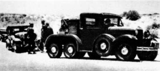 фото - Кочнев Е. "Автомобили Красной Армии 1918-1945"; 1936-й год, опытный ГАЗ-АААА - шасси пикапа ГАЗ-А с дополнительной осью, агрегатами и трансмиссией ГАЗ-ААА, запасные колёса установлены для создания опоры при преодолении препятствий