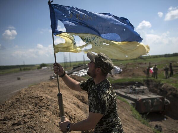    © AP Photo / Evgeniy Maloletka