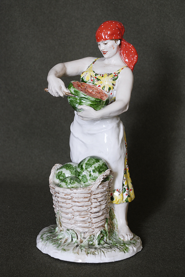Скульптура "Женщина с арбузом". 1954-1958. Фарфор, роспись надглазурная. Размеры: 33.4*16,5*16,0 см.  Государственное автономное учреждение культуры Новосибирской области "Новосибирский государственный художественный музей".