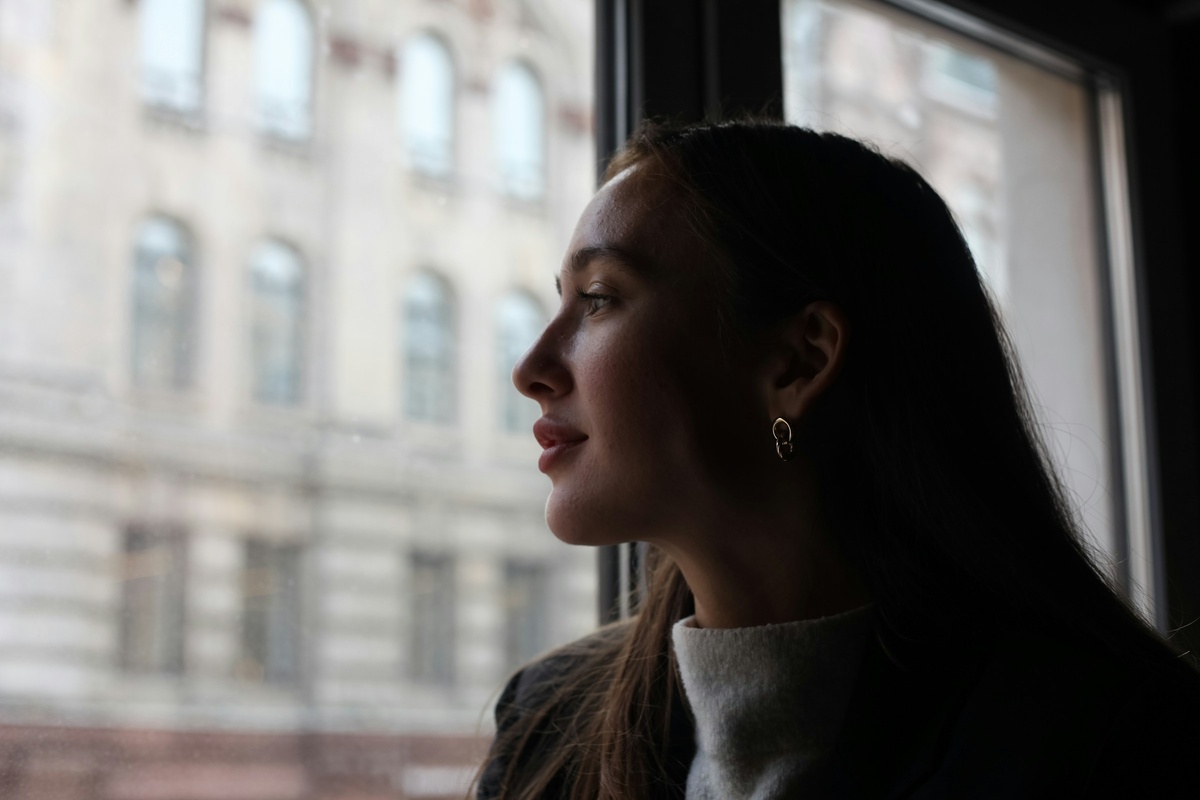 Photo by <a href="https://unsplash.com/@engelman_alex?utm_content=creditCopyText&utm_medium=referral&utm_source=unsplash">Alex Engelman</a> on <a href="https://unsplash.com/photos/a-woman-looking-out-a-window-at-a-building-1Ls_k4FB9mE?utm_content=creditCopyText&utm_medium=referral&utm_source=unsplash">Unsplash</a>
      