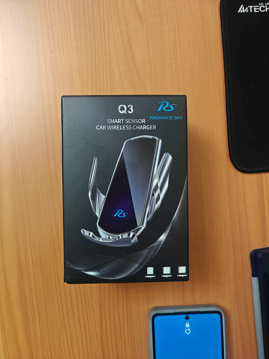 Держатель для телефона в воздуховод с функцией беспроводной зарядки.